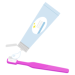 ピンクの歯ブラシに歯磨き粉をつけるイラスト