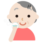 顔に粉をはたく高齢者の女性のイラスト